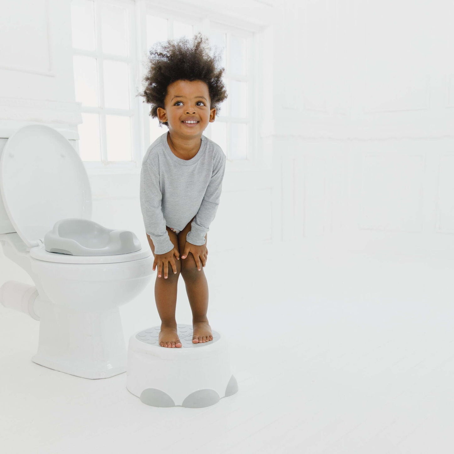 Bumbo Step 'n Potty Cool Grey Step in Action